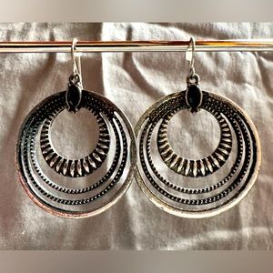 Silver and black circular dangle earring